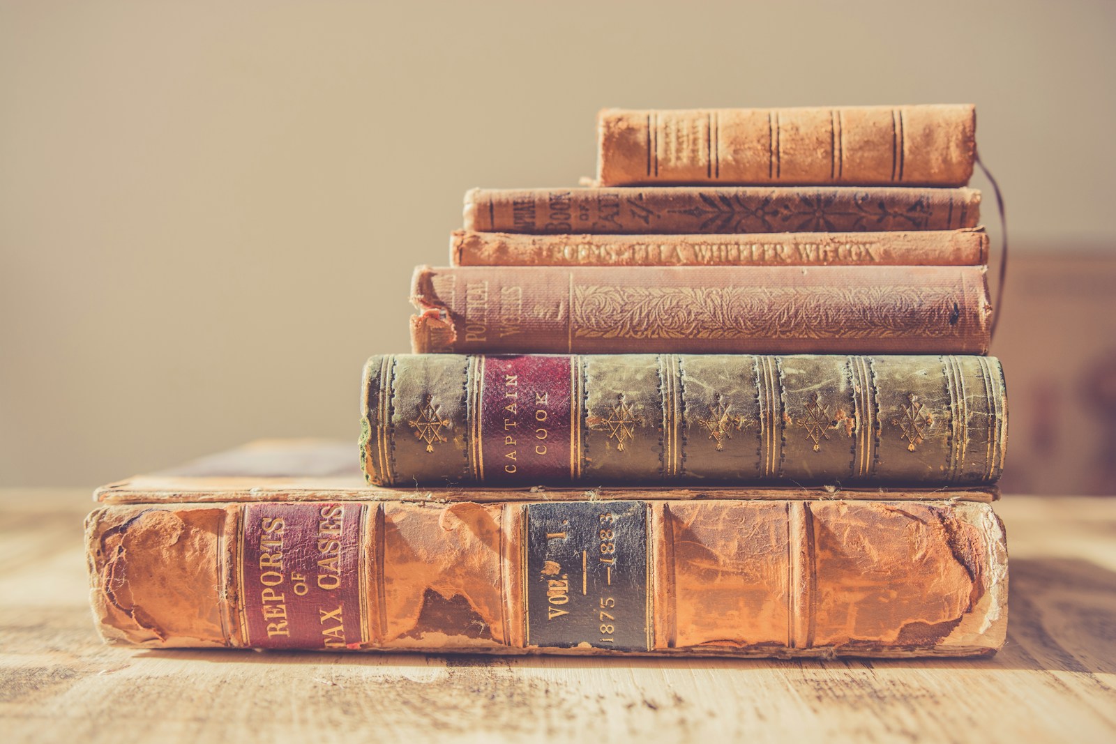 Stack of old books in shallow focus