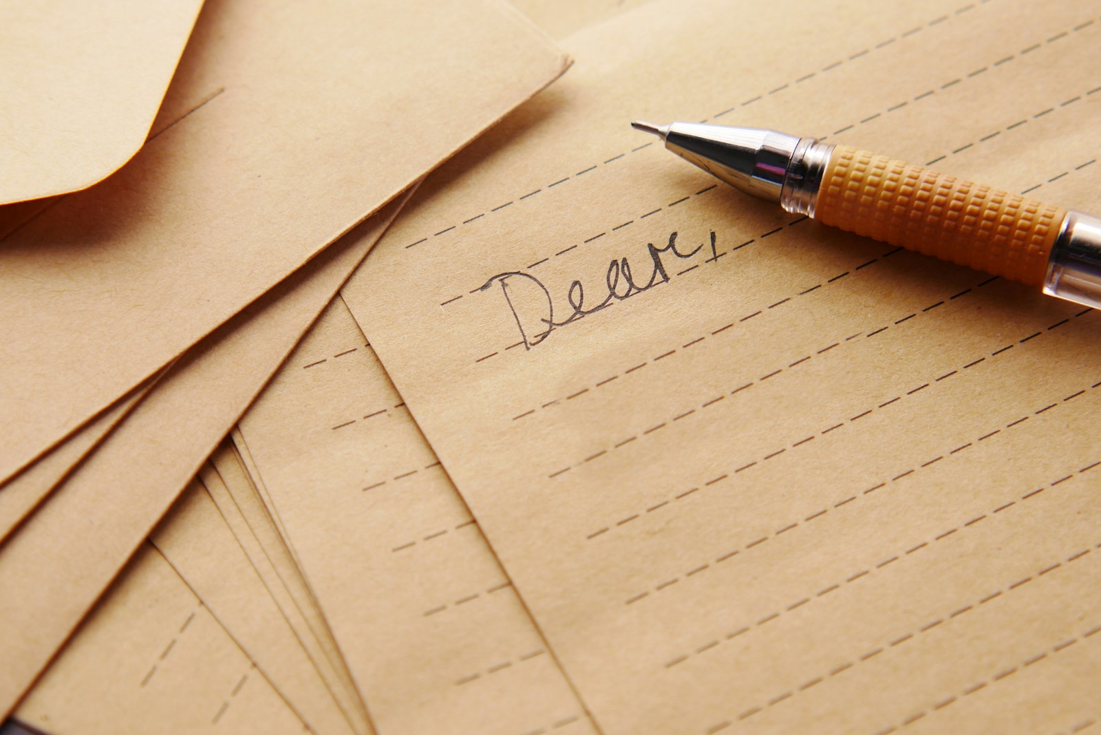 Pen resting on a sheet of paper