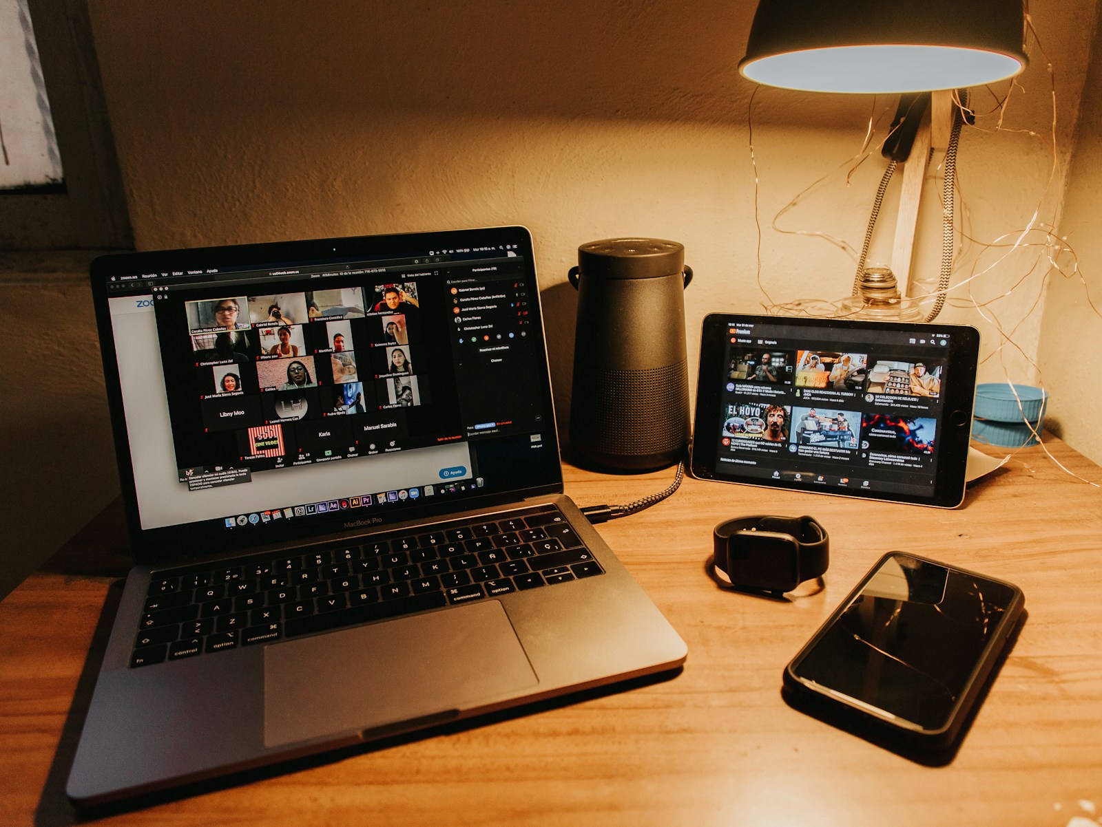 Laptop on a wooden table ready for a video call