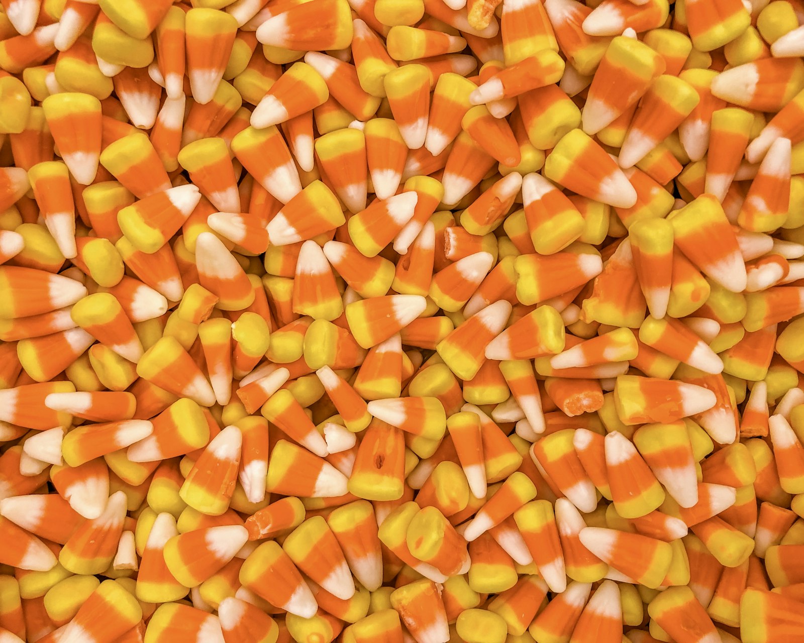 Pile of orange and white Halloween candy corn